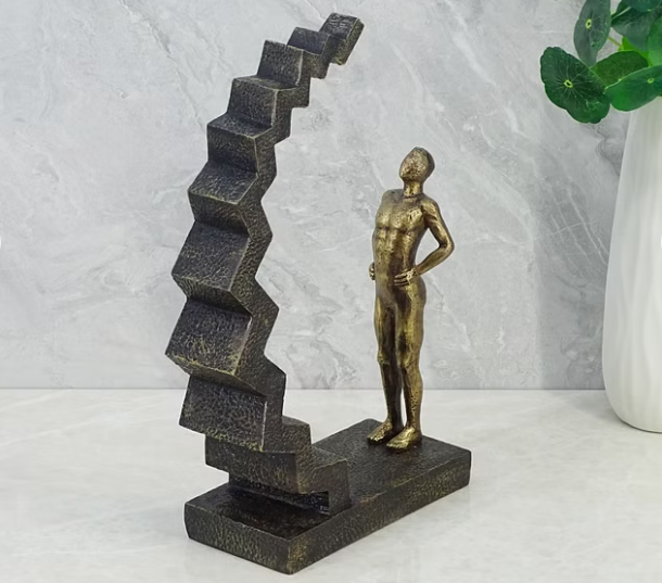 Willow Polyresin Man on Staircase 33 Cm in Brown and Gold Color